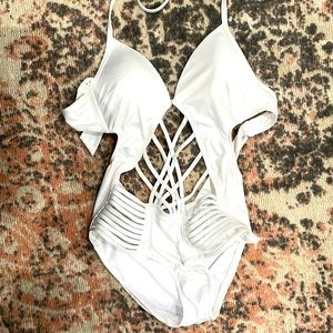 Kenneth Cole white cut out one piece with halter top.